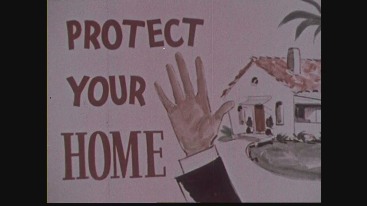 Carton illustré d'un film américain : PROTECT YOUR HOME, une main levée et une maison